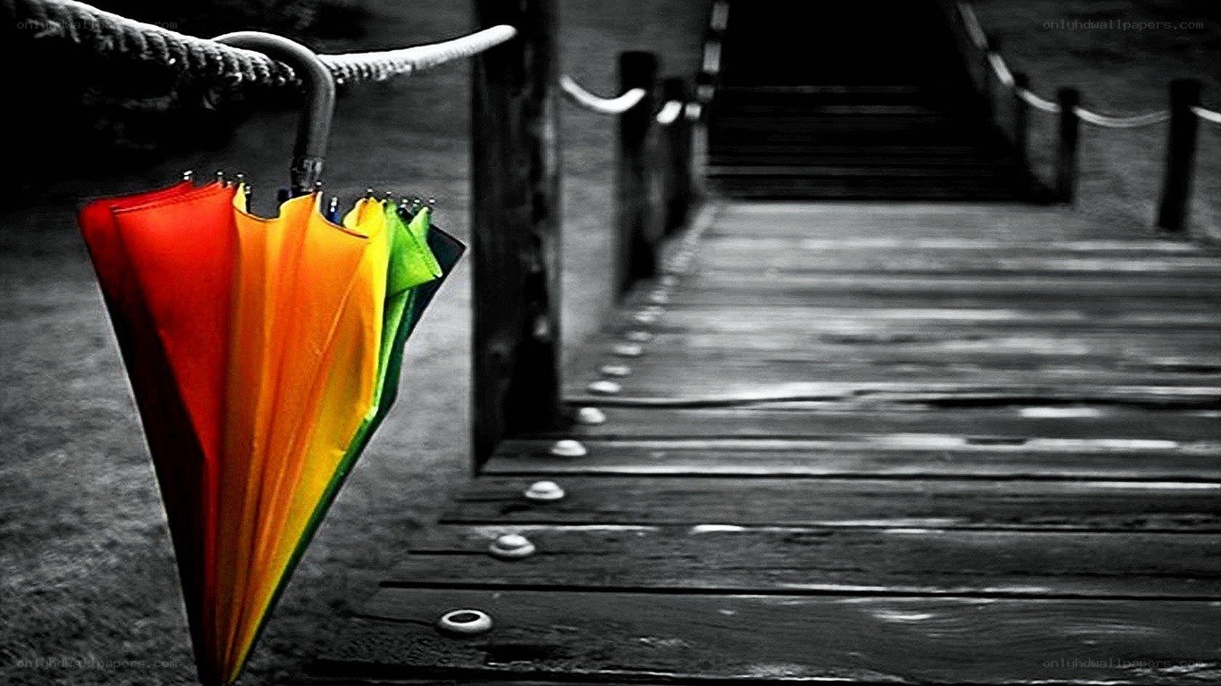 Colorful umbrella on a dock