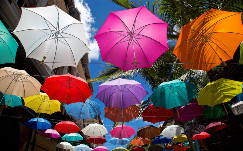 Colorful Umbrellas Hanging — Pink