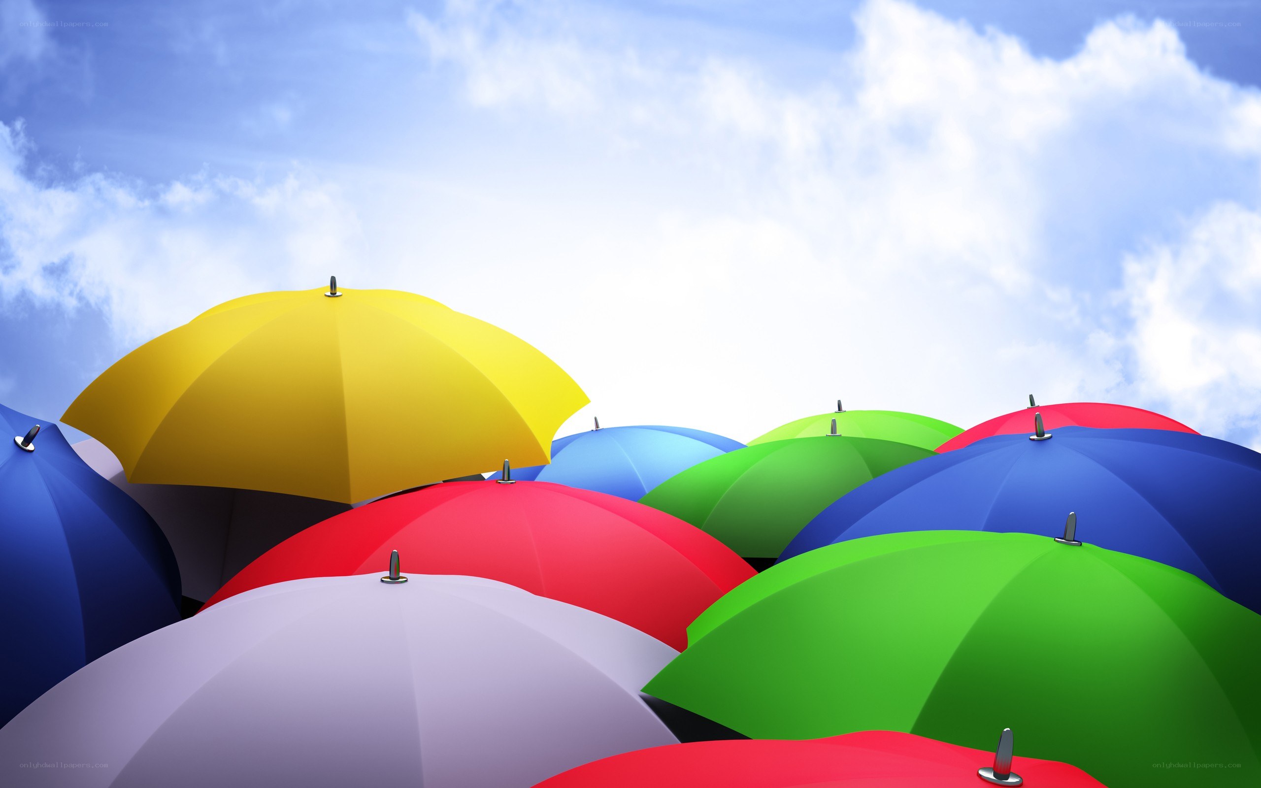 Colorful umbrellas under blue sky