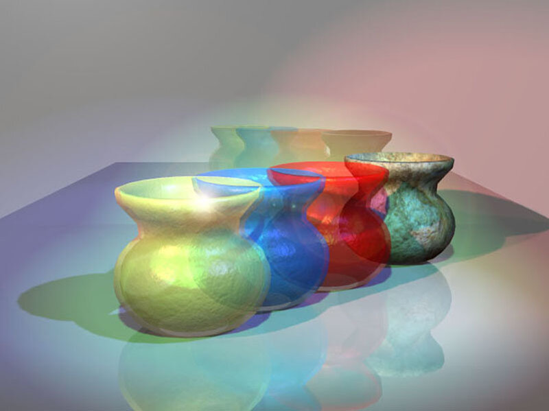 Colorful vases on reflective surface