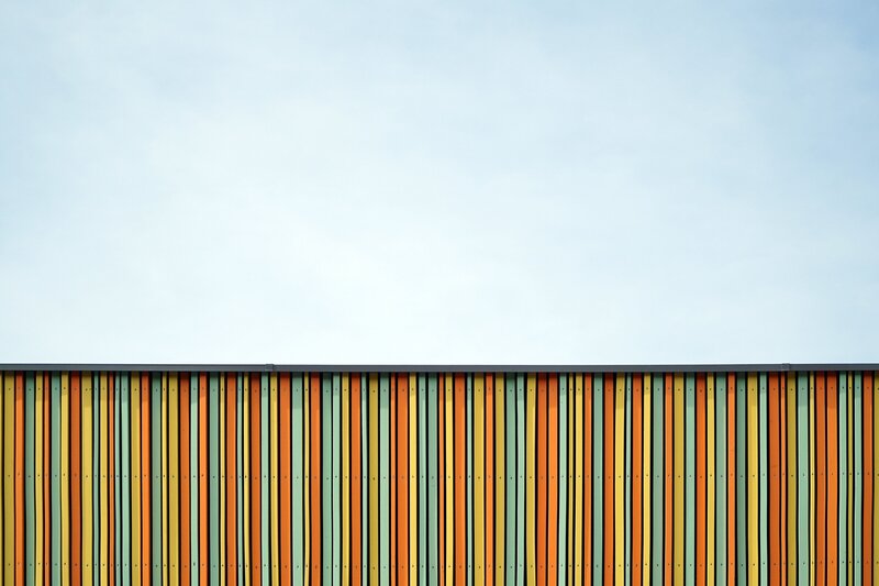 Colorful vertical stripes on building