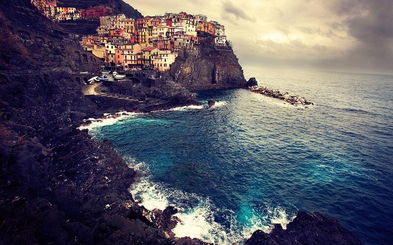 Colorful village on a cliffside