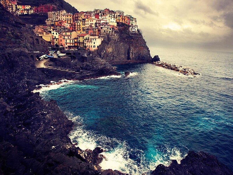 Colorful village on a cliffside