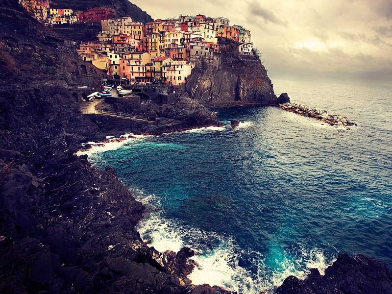 Colorful village on a cliffside
