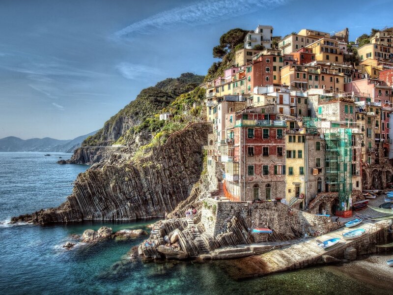 Colorful Village on Cliff — Blue, Dramatic, Afternoon, Photograph, Sea, Boats