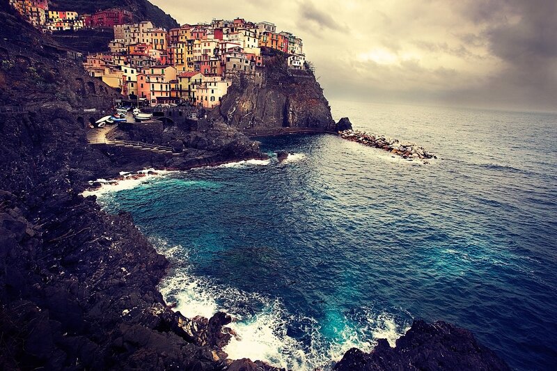 Colorful Village on Cliff — Blue, Dramatic, Photograph
