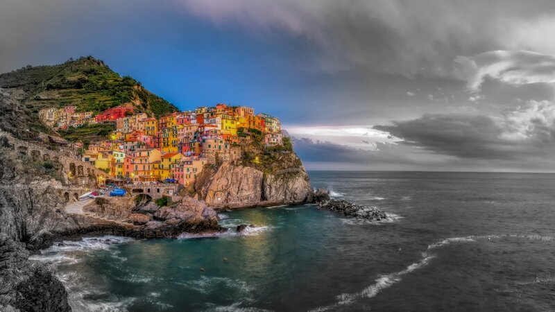 Colorful Village on Cliff — Blue, Dramatic, Sunset, Photograph, Sea, Mountain