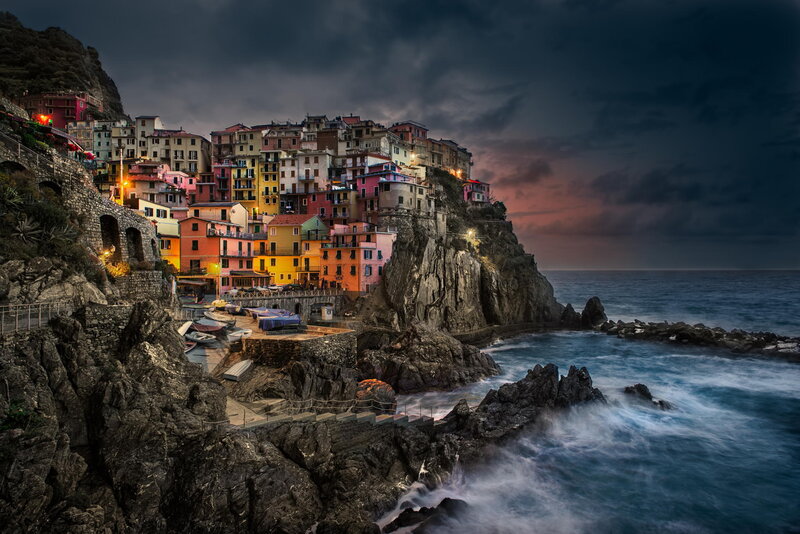 Colorful Village on Cliff — Blue, Dramatic, Sunset, Photograph