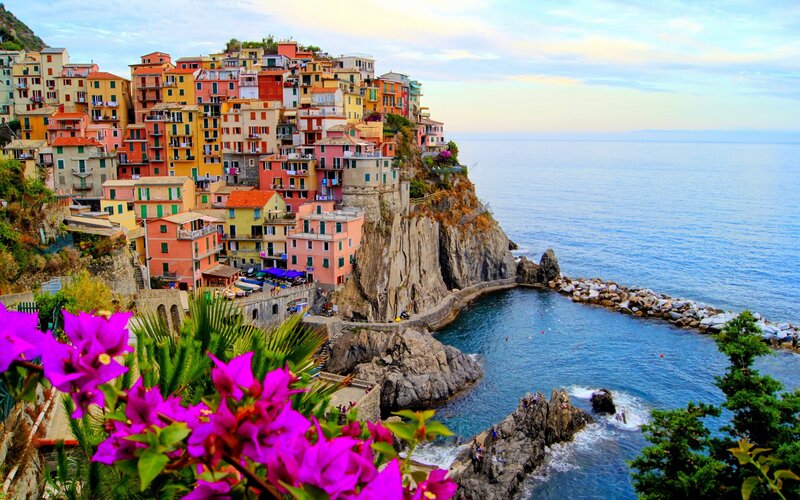Colorful Village on Cliff — Blue, Serene, Sunset, Photograph