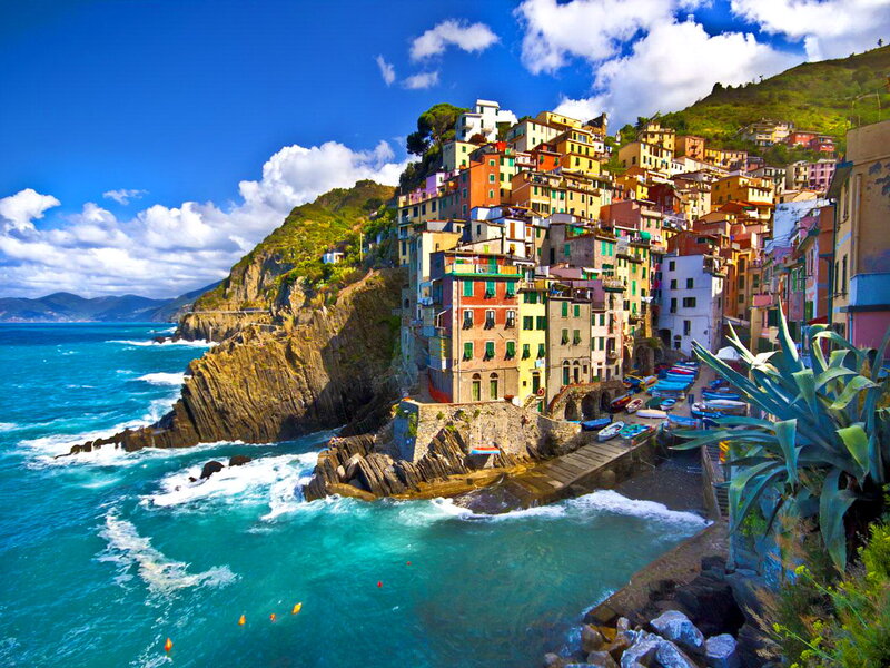 Colorful Village on Cliff — Blue, Vibrant