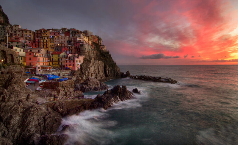 Colorful Village on Cliff — Red, Dramatic, Sunset