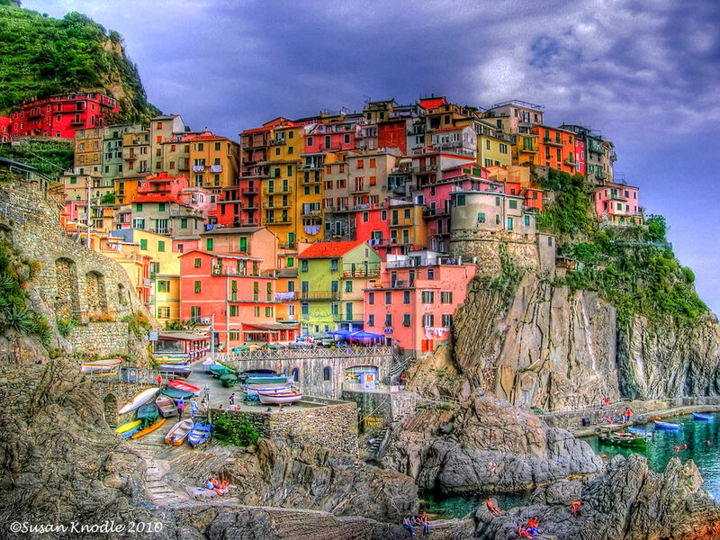 Colorful Village on Cliff — Red, Dramatic