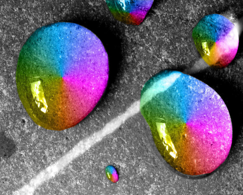 Colorful water droplets on stone