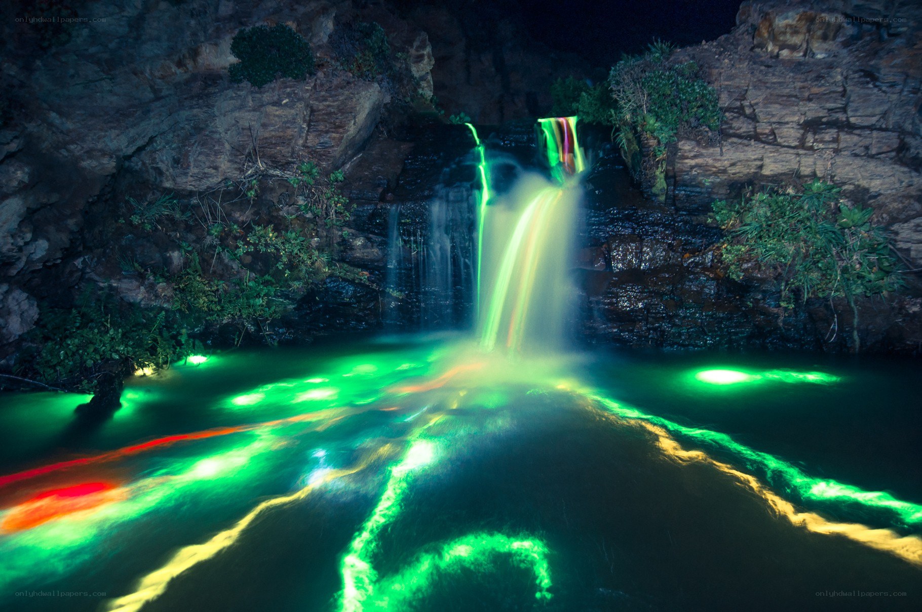 colorful waterfall at night