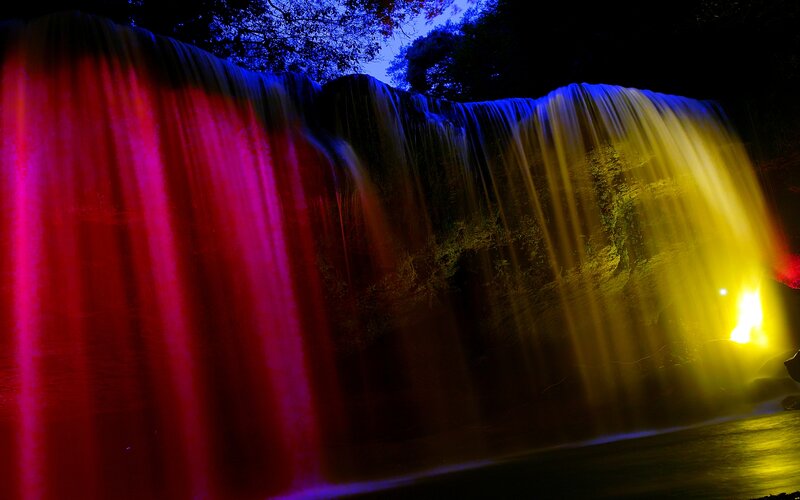 Colorful Waterfall at Night — Red