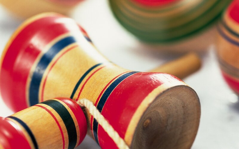 Colorful wooden spinning tops
