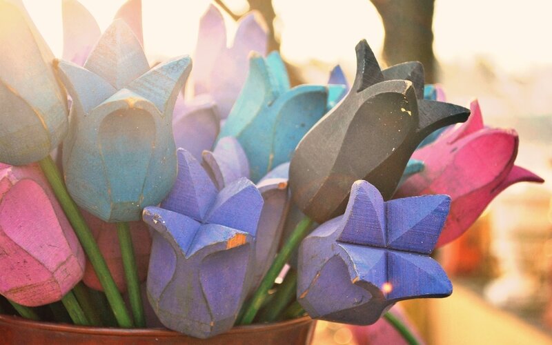 Colorful wooden tulips in a pot