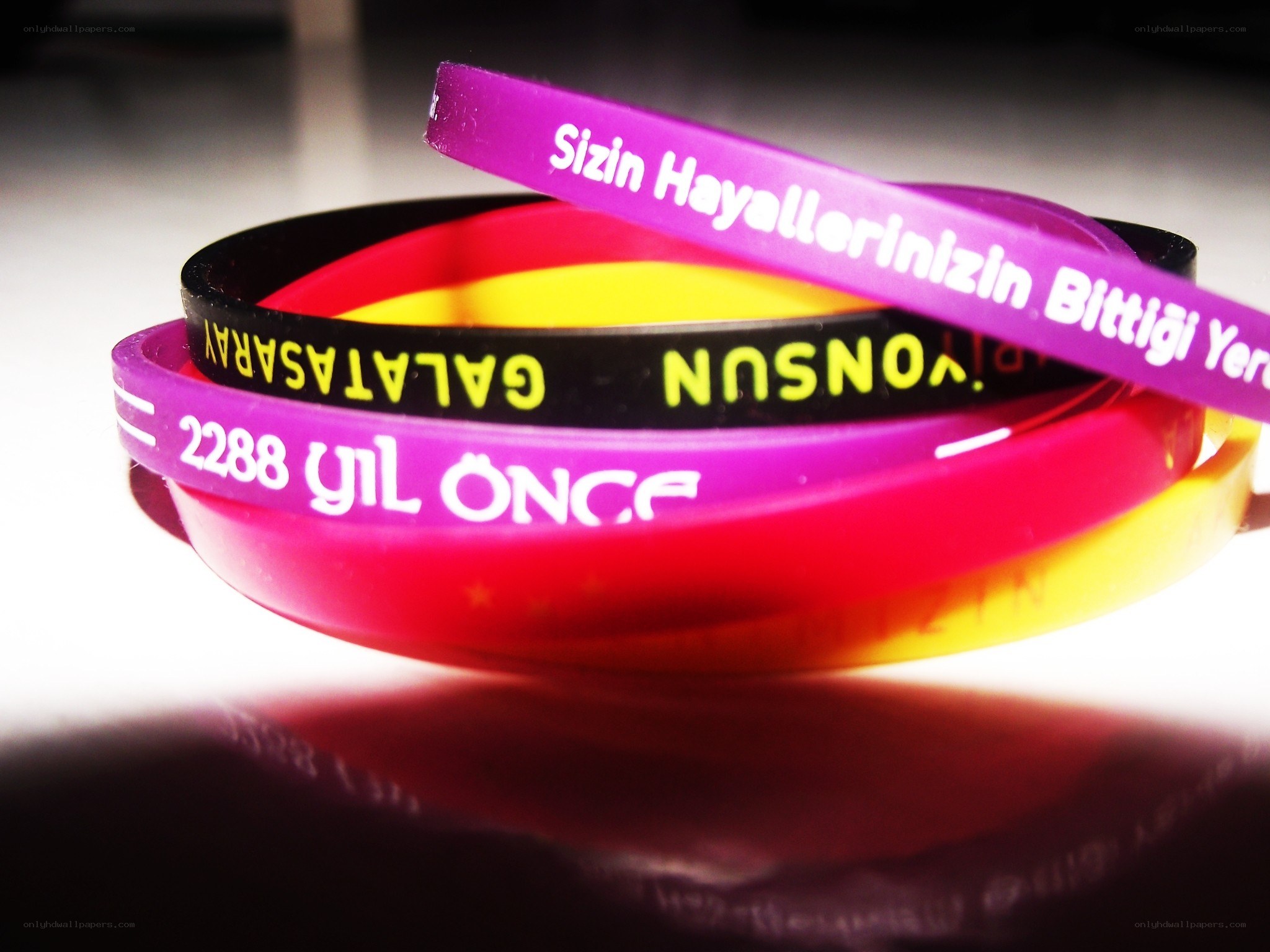 colorful wristbands with text
