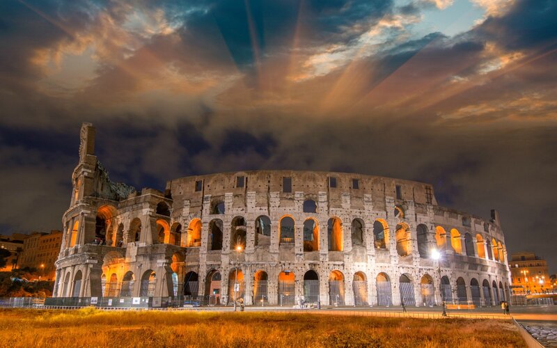 Colosseum at Night — Orange, Dramatic, Photograph