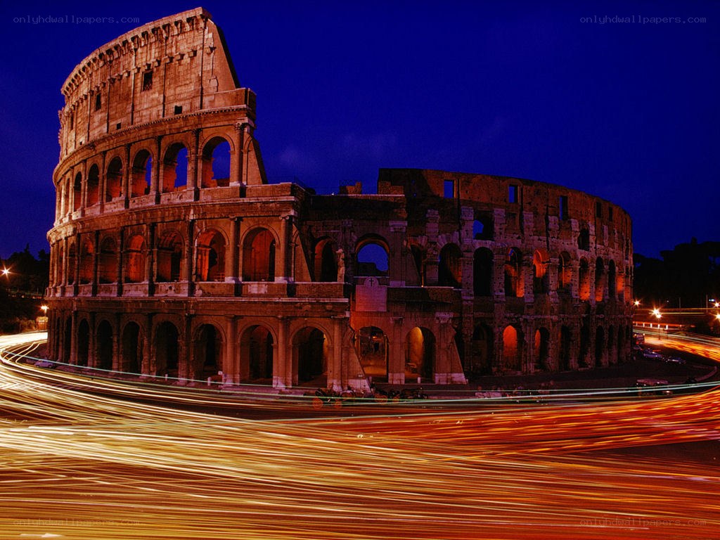 Colosseum at night with light trails