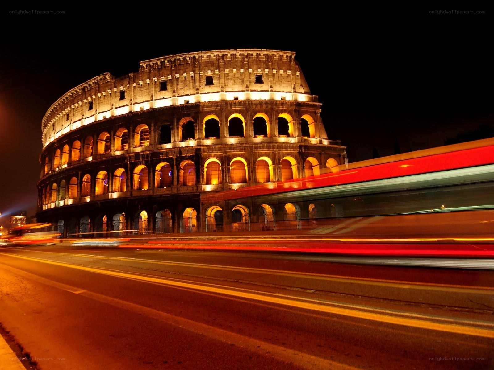 Colosseum at night with light trails