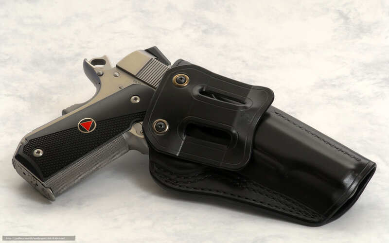 Colt 1911 pistol in holster