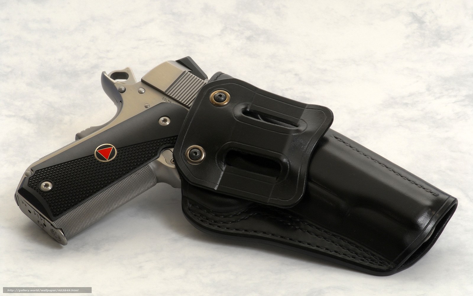 Colt 1911 pistol in holster