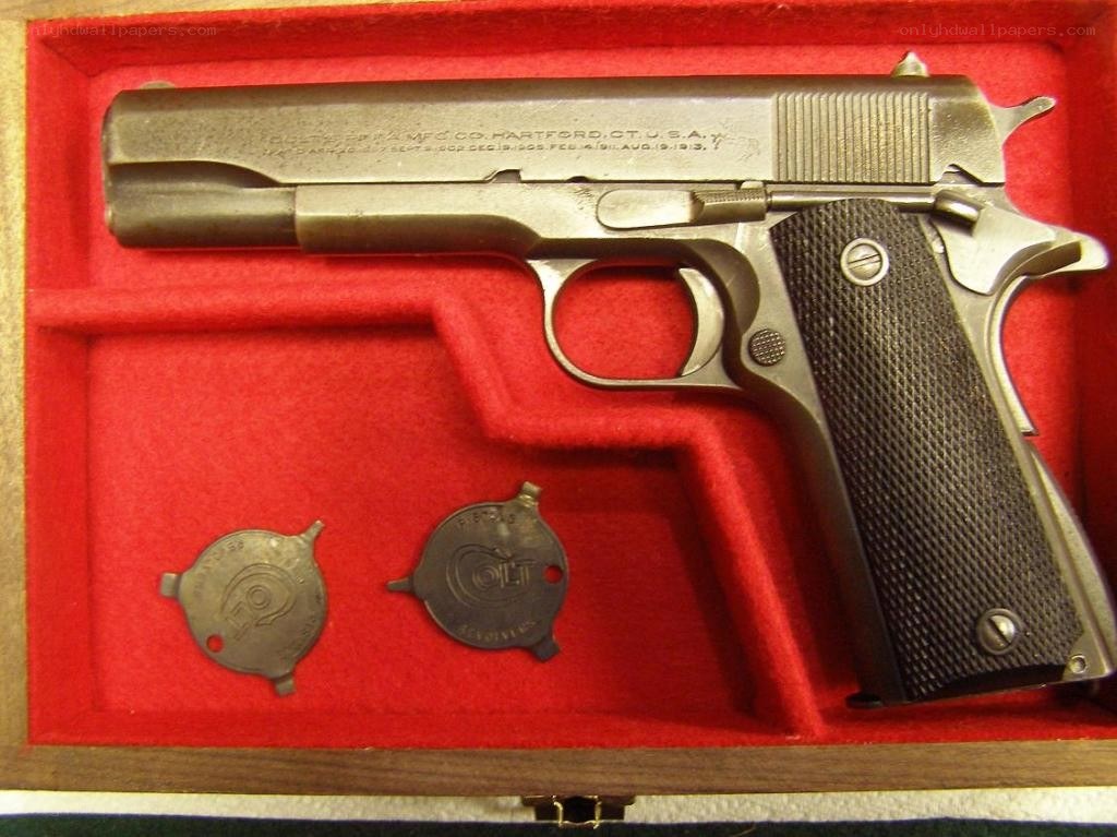 Colt pistol in display case