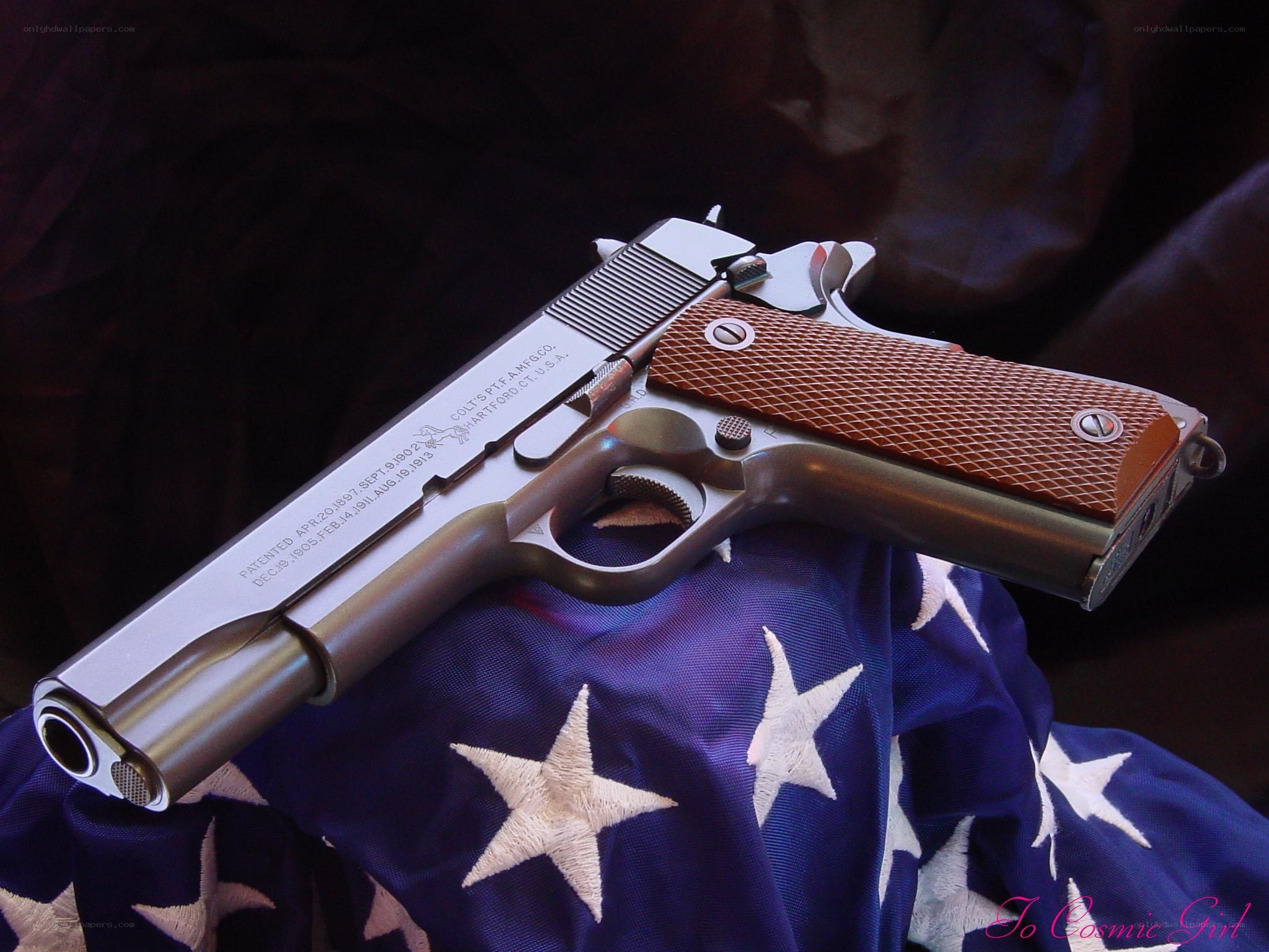Colt pistol on flag