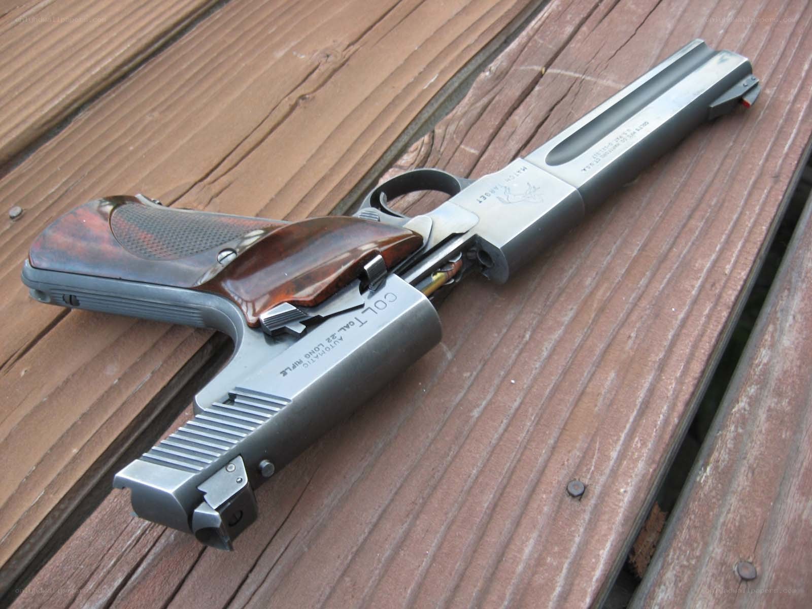 Colt Target pistol on deck