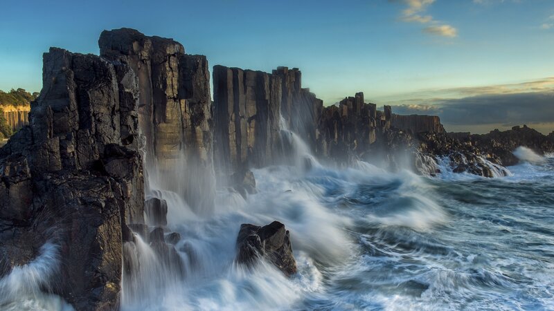 Columnar Basalt Cliffs — Blue, Dramatic, Sunset