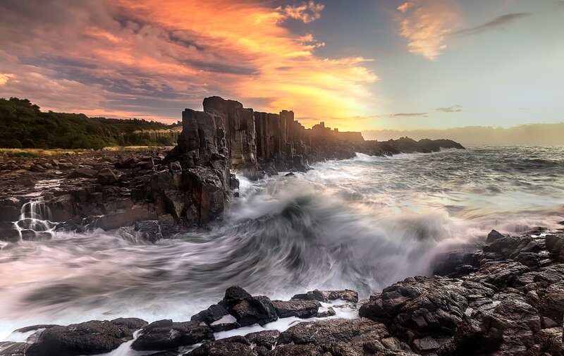 Columnar Basalt Cliffs — Orange