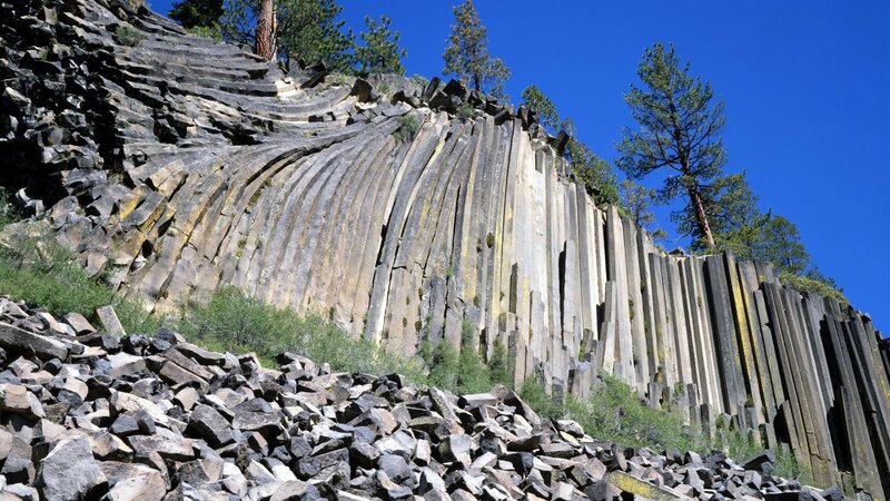 Columnar Basalt Formation — Blue, Dramatic, Afternoon, Photograph, Trees, Rocks