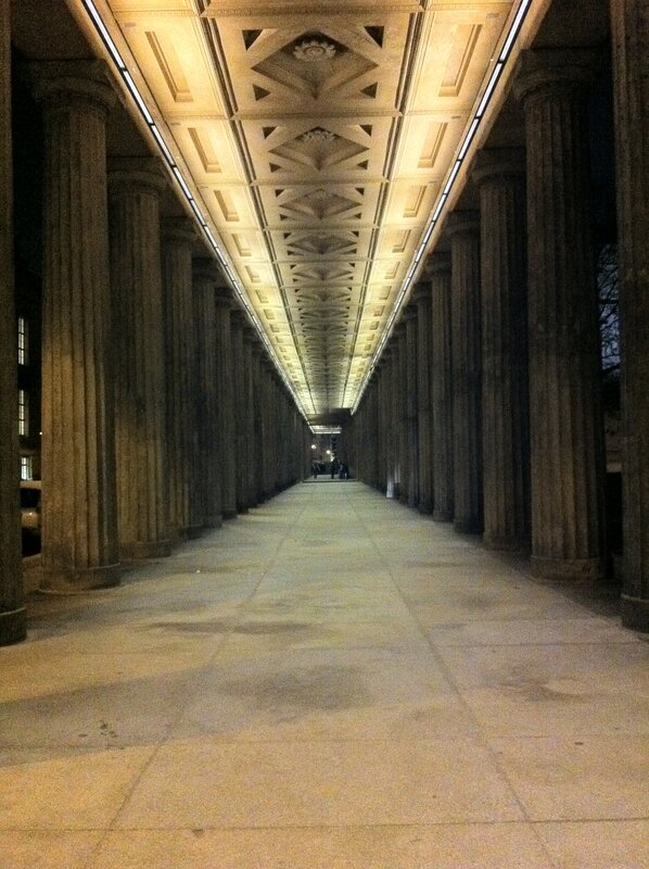 columned walkway at night