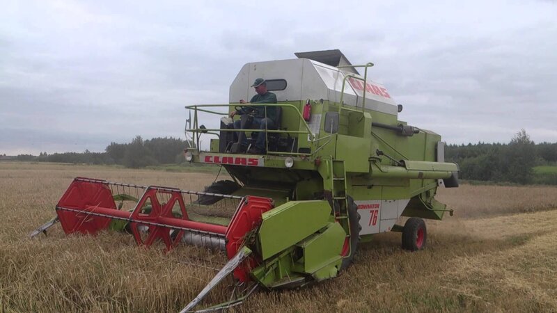 Combine Harvester in Field — Green
