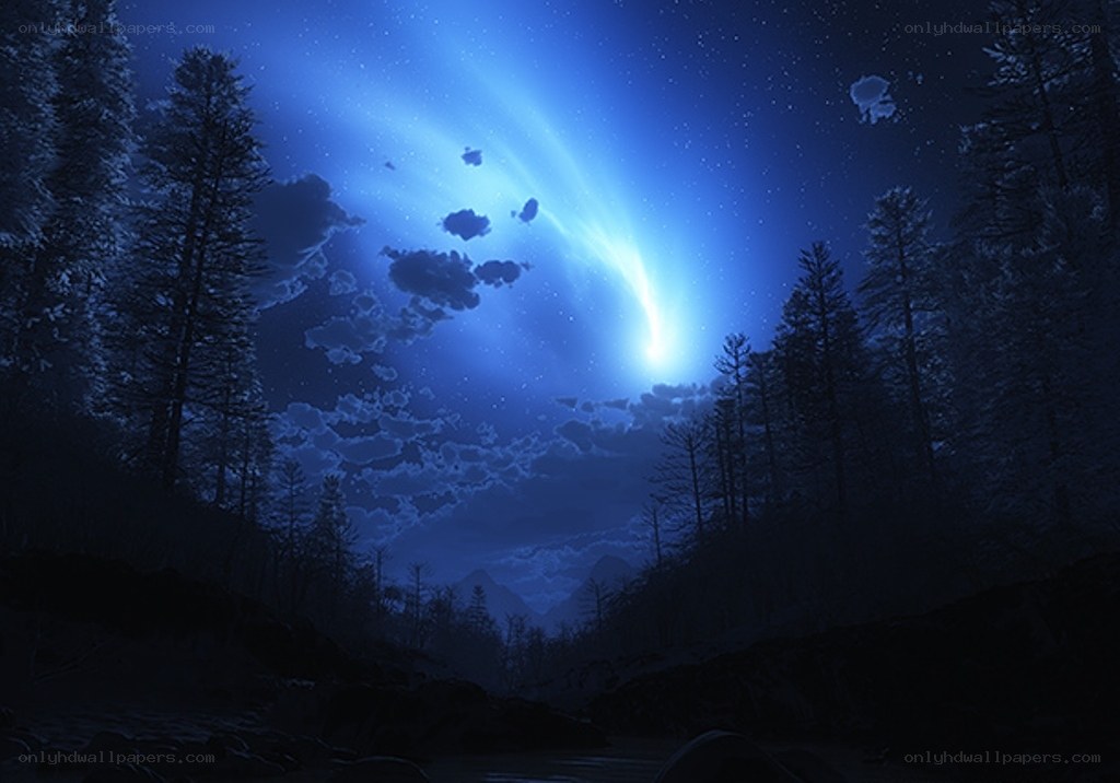 Comet over forest at night