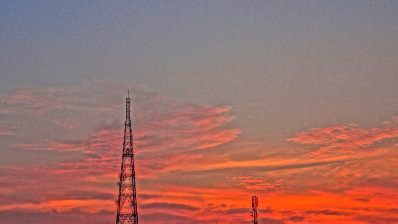 Communication Towers at Sunset