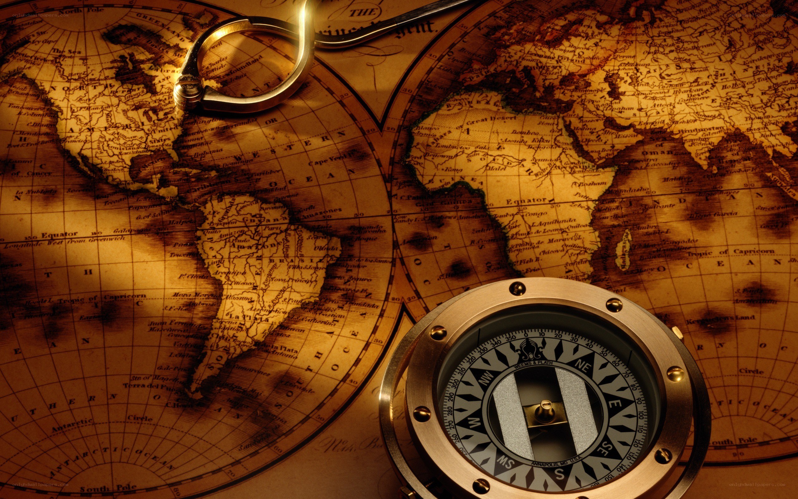 compass on vintage world map