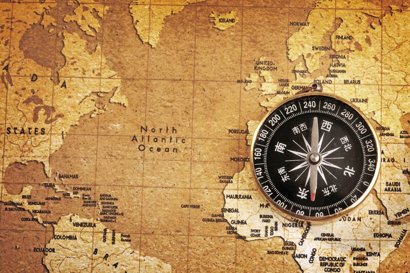 Compass on World Map — Brown, Exploratory