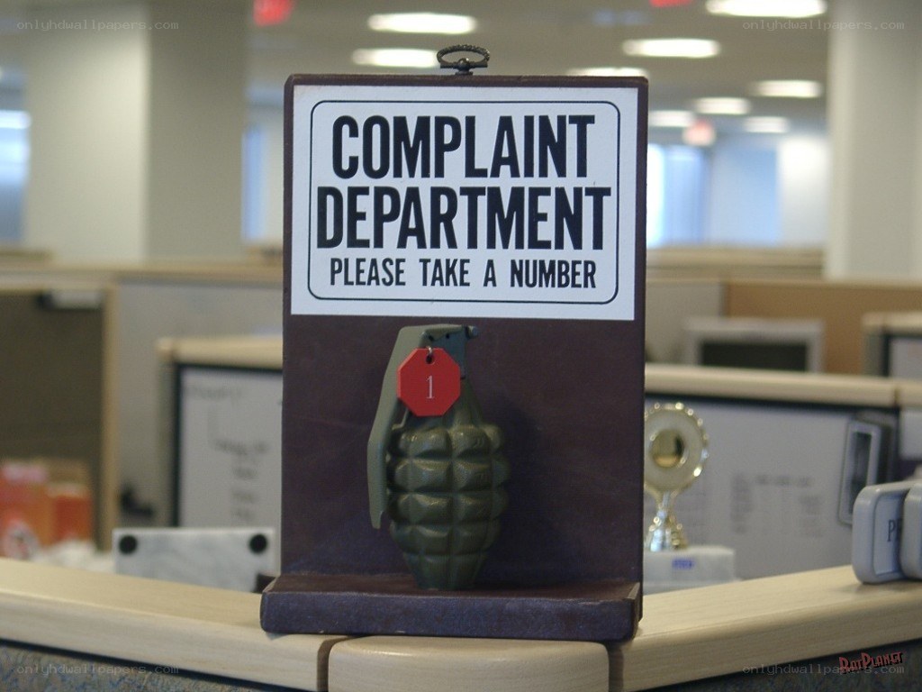 Complaint Department Sign with Grenade