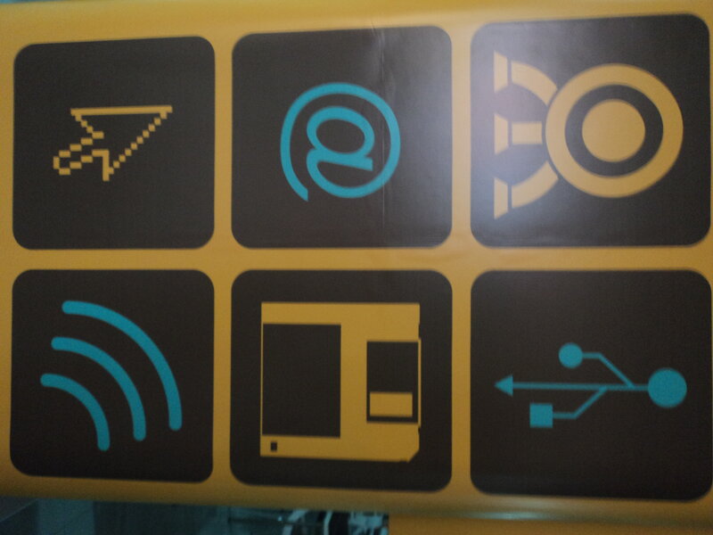 computer icons on yellow background