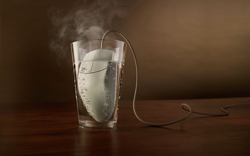 computer mouse in steaming water