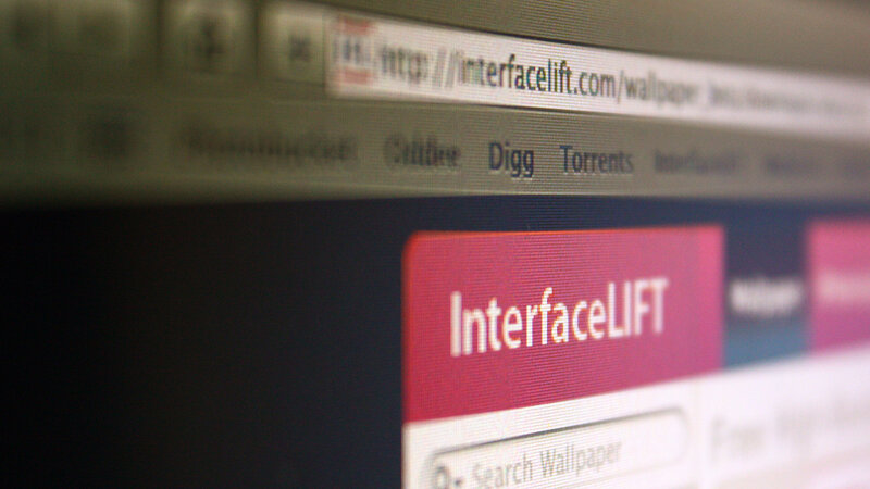 Computer Screen Displaying Website — Red