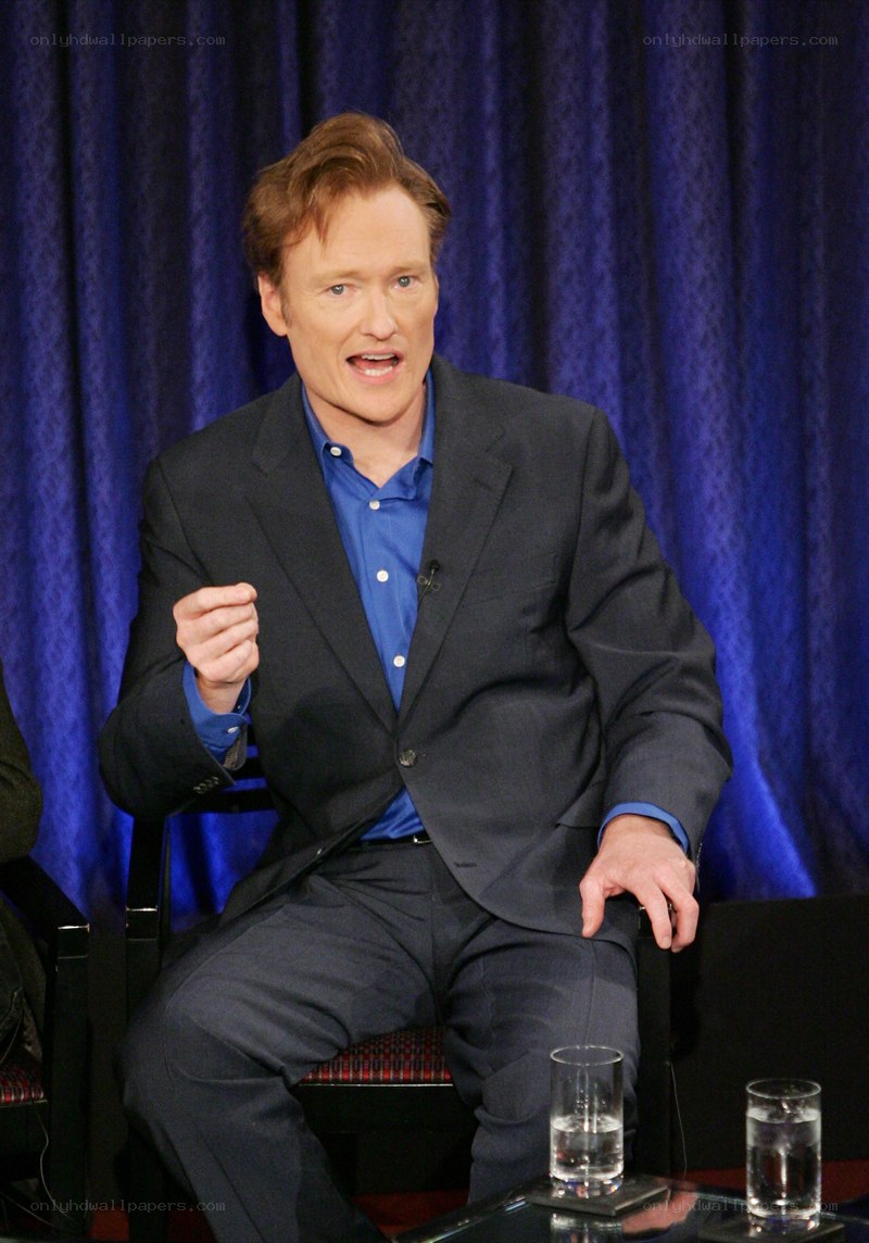 Conan O'Brien speaking on stage
