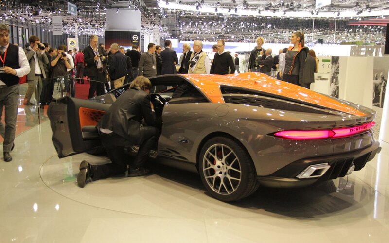 Concept Car on Display — Gray, Busy