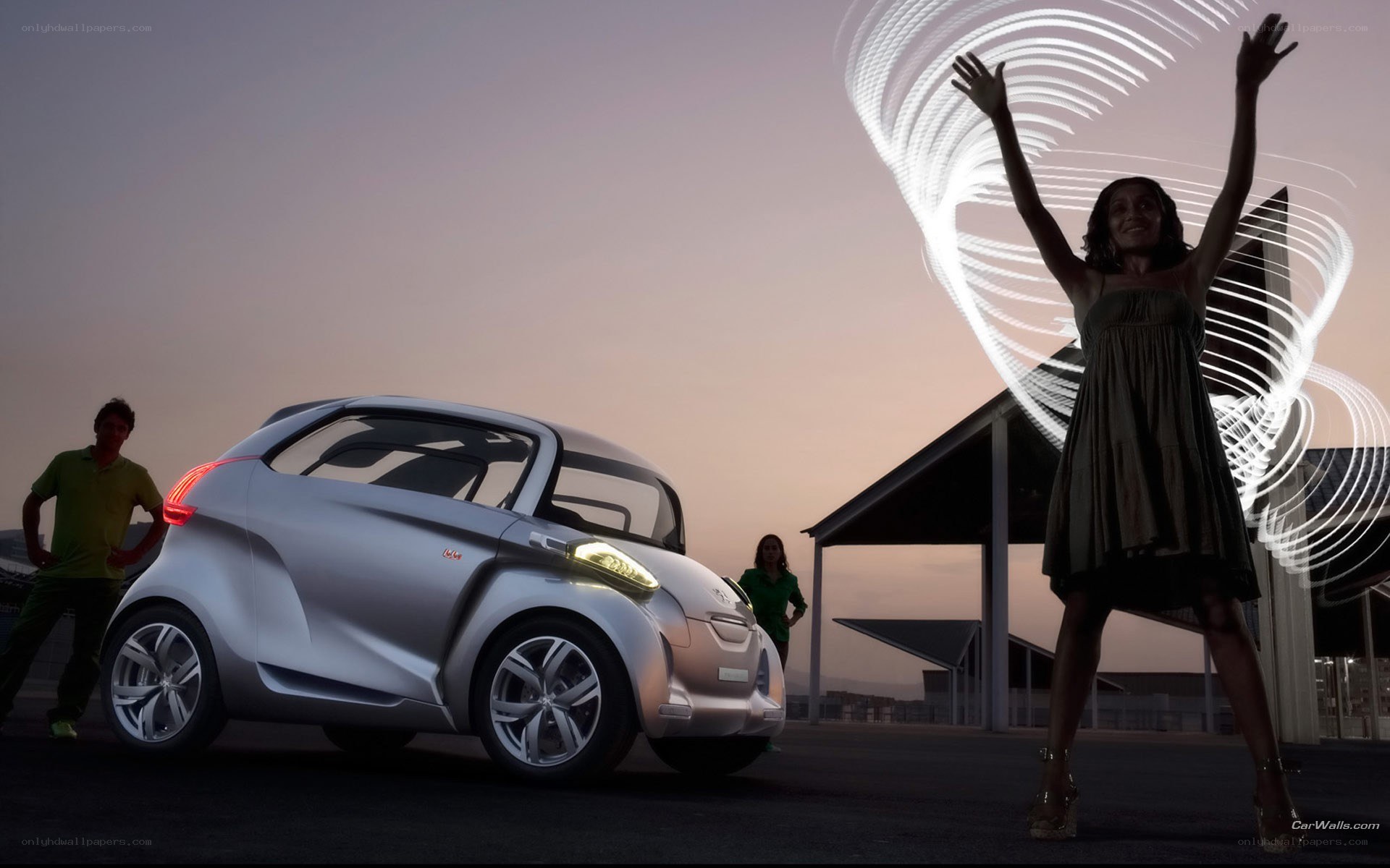 Concept car with people at dusk