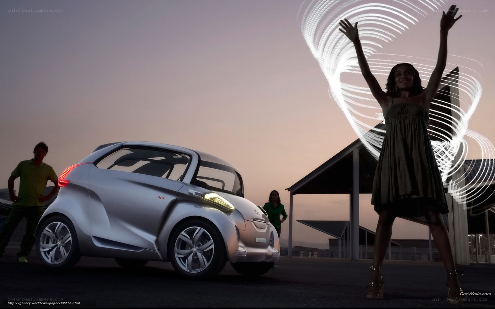 Concept car with people at dusk