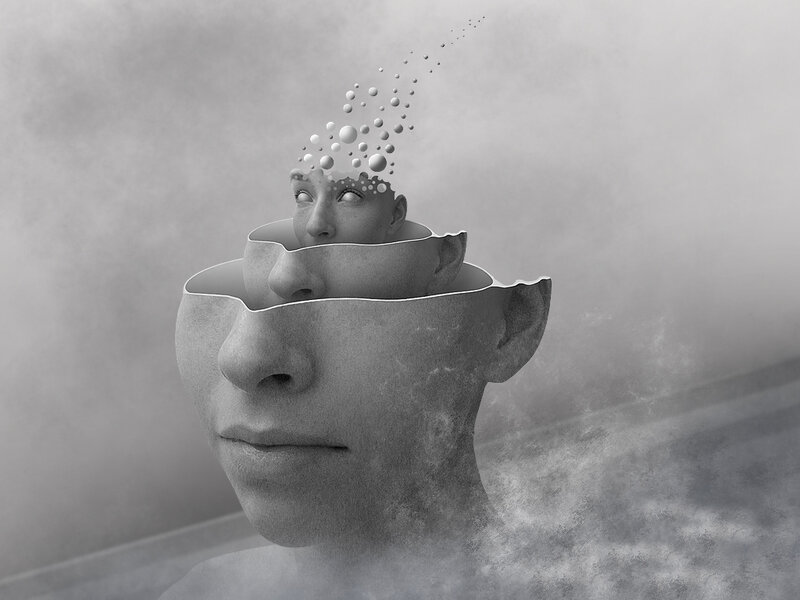 conceptual head with floating particles