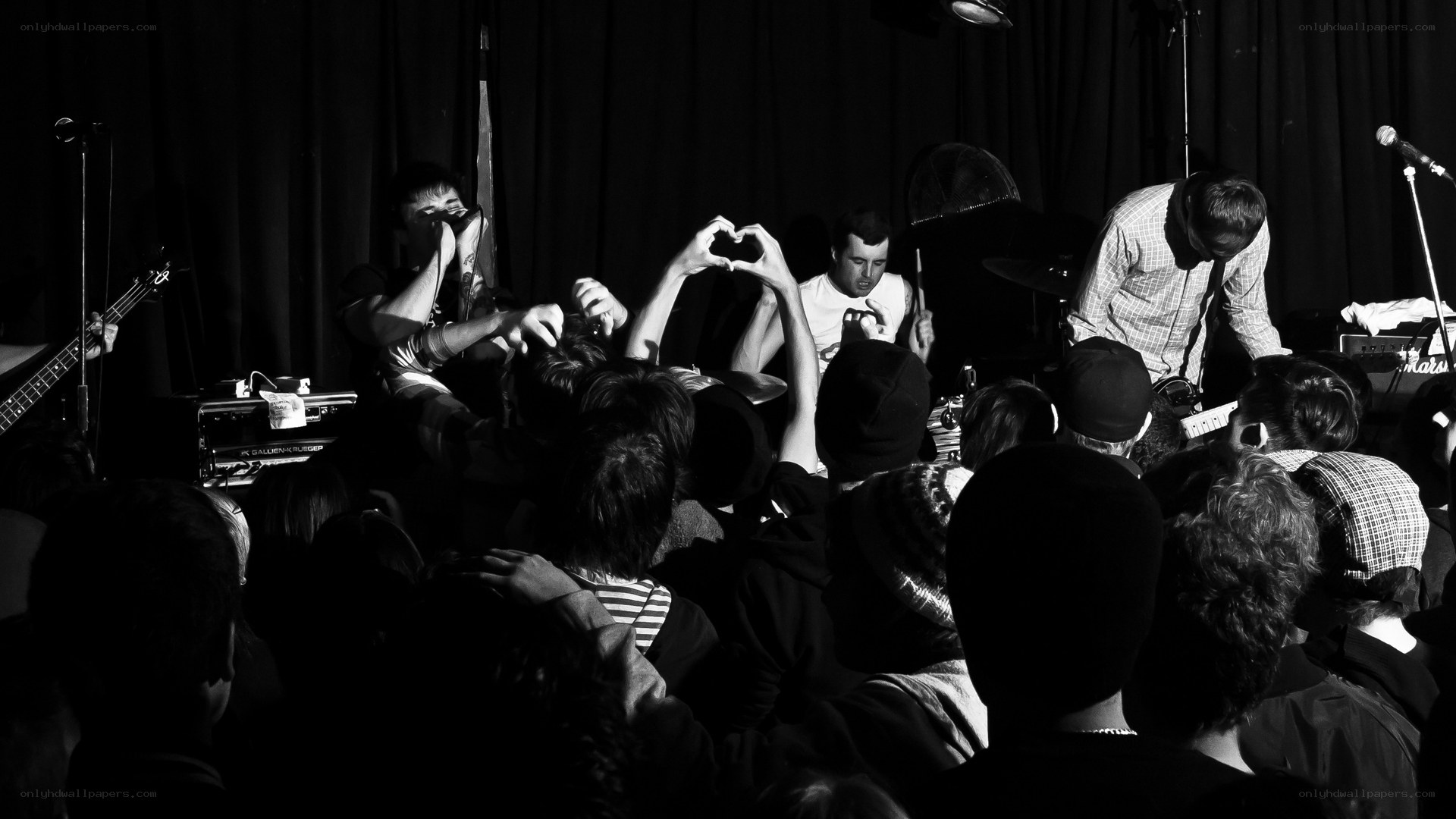 Concert crowd making heart shape