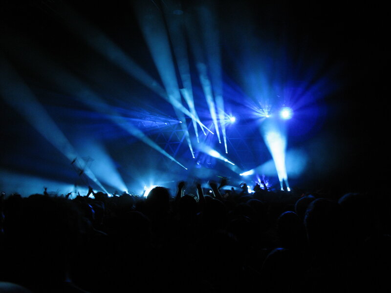 Concert crowd under blue lights